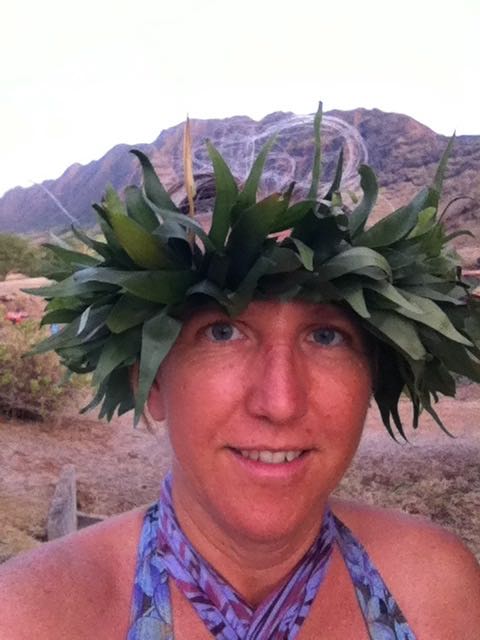 Image of Mariko with a Hawaiian head haku lei